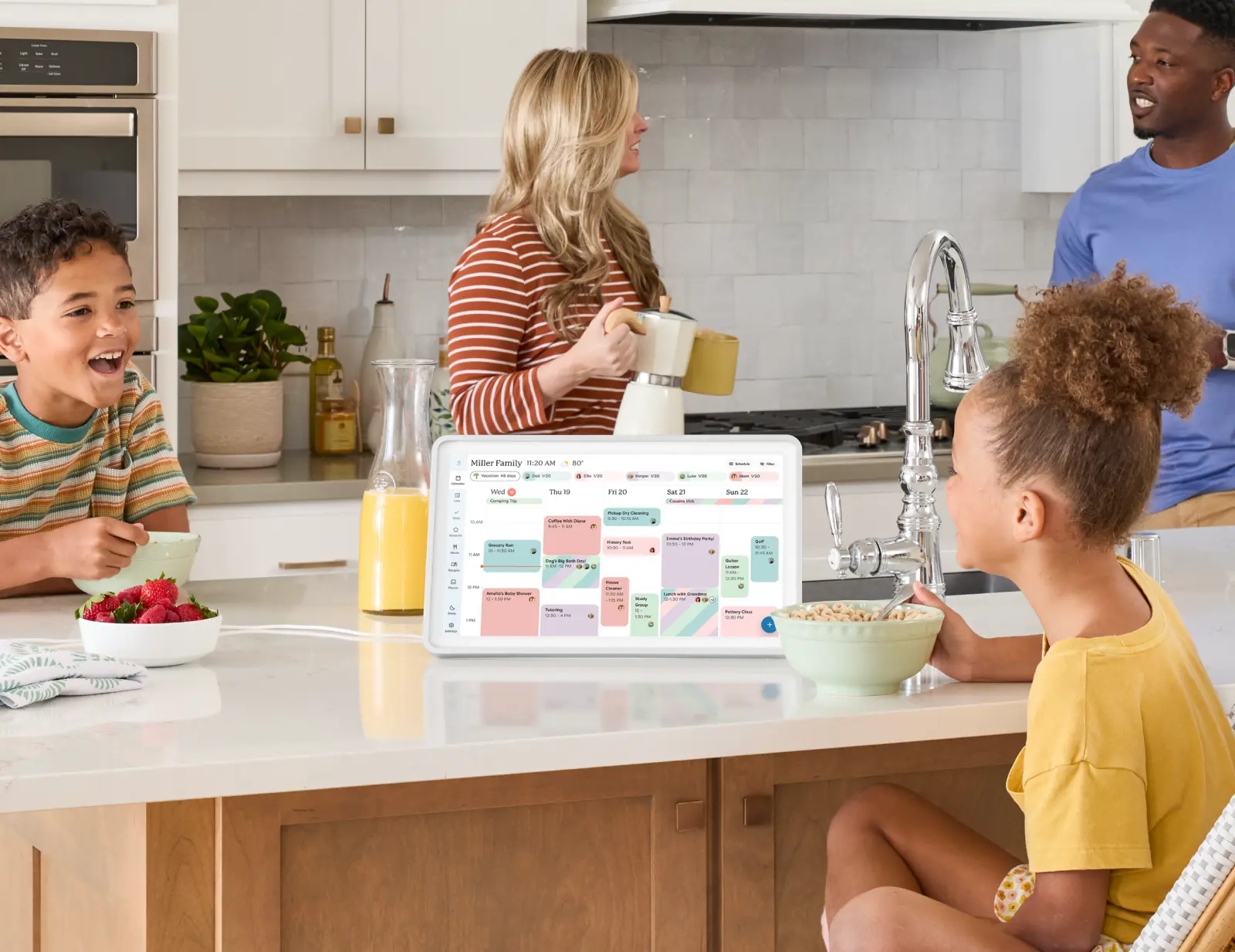 Family in the kitchen with a skylight calendar